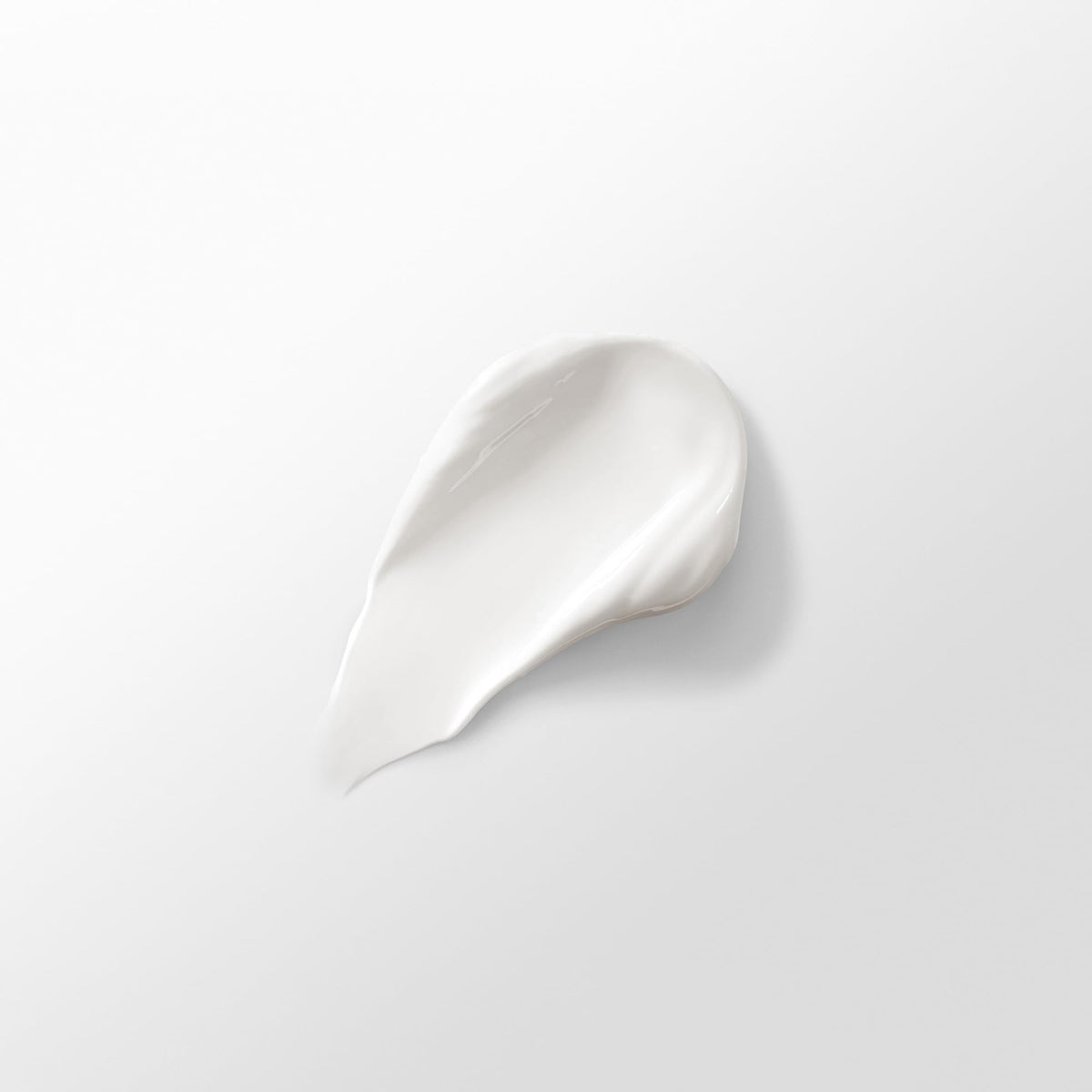 Hourglass texture close-up highlighting silky, hydrating finish