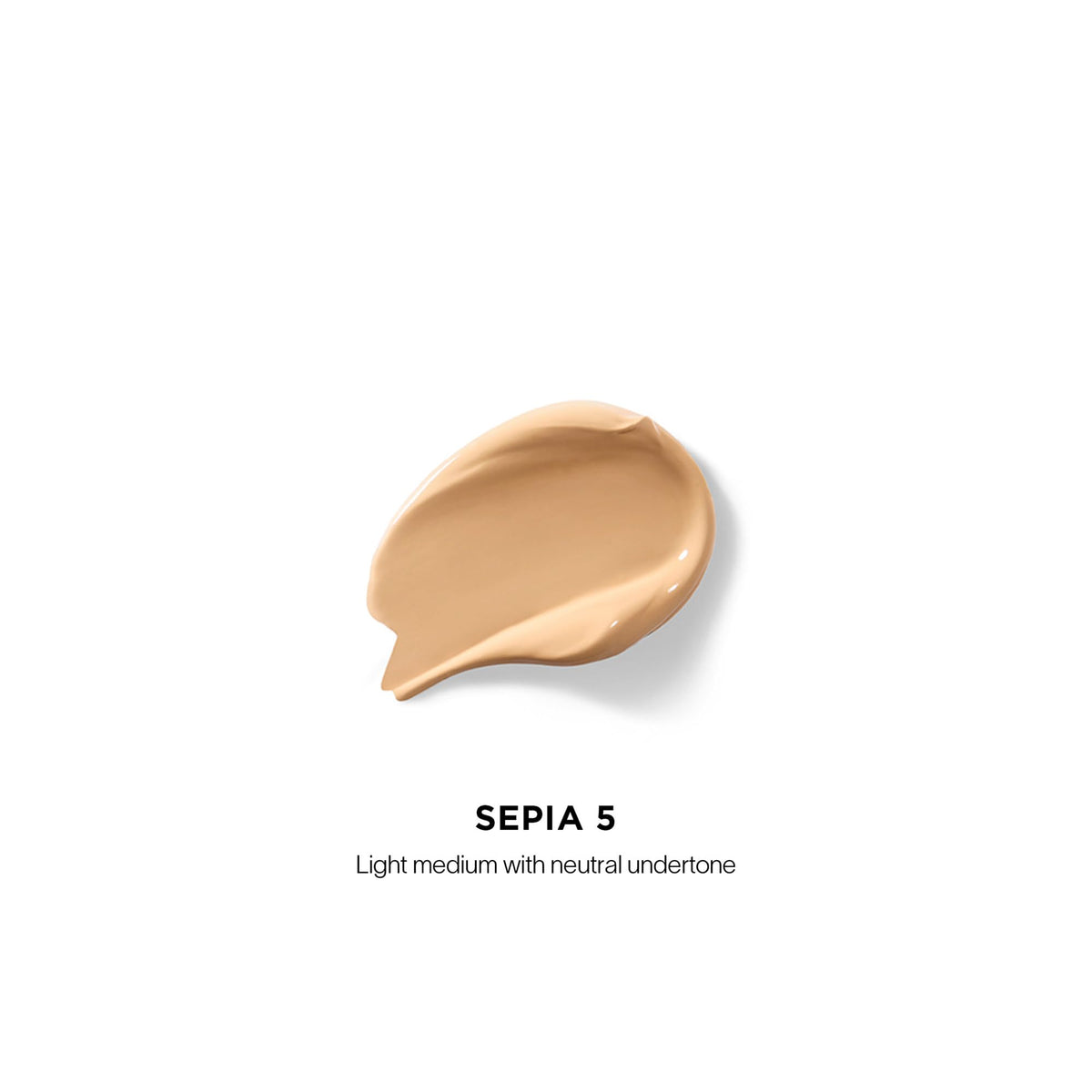 HOURGLASS concealer wand applicator demonstrating precise, clean application