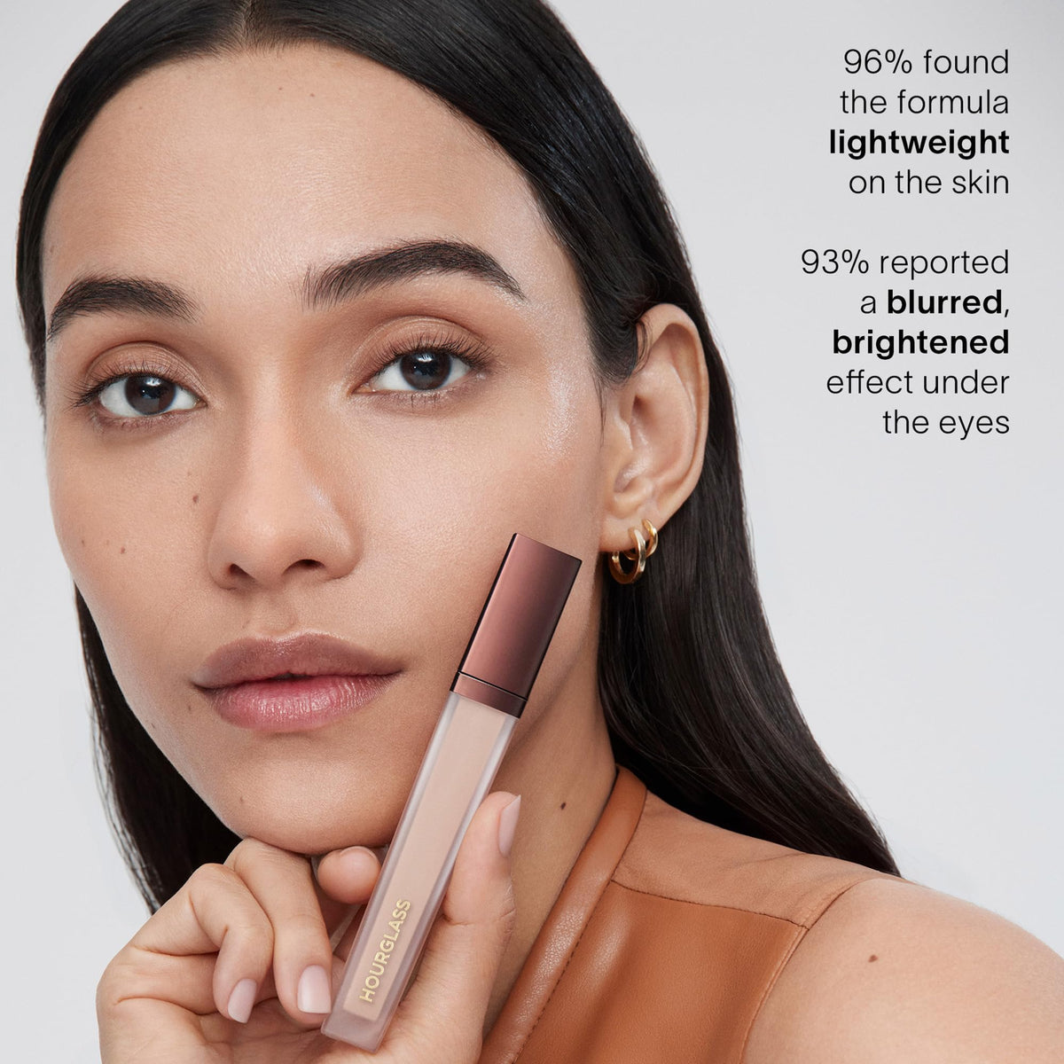HOURGLASS concealer in bag travel shot showing durable, on-the-go wear