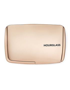 HOURGLASS close-up of powder surface revealing smooth texture for blur benefit