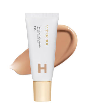 HOURGLASS front bottle showing clean branding and dewy finish benefit