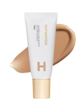 HOURGLASS front packaging showing sleek bottle and product identity and easy application benefit