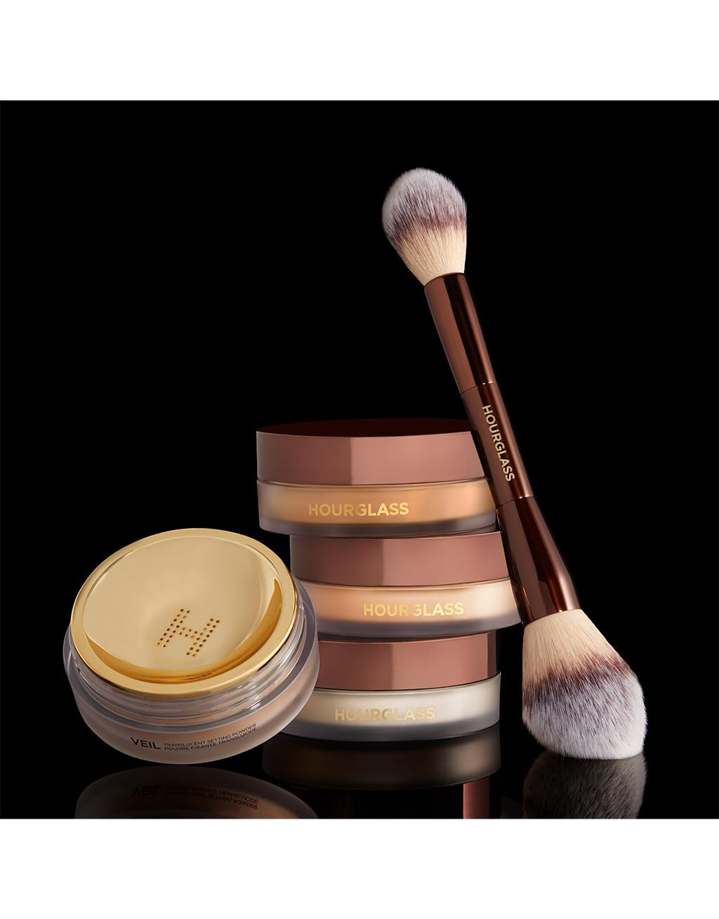 HOURGLASS loose powder texture close-up showing ultra-fine blur benefit