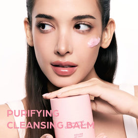 House of Hur balm on fingertip melting to oil for effortless cleansing