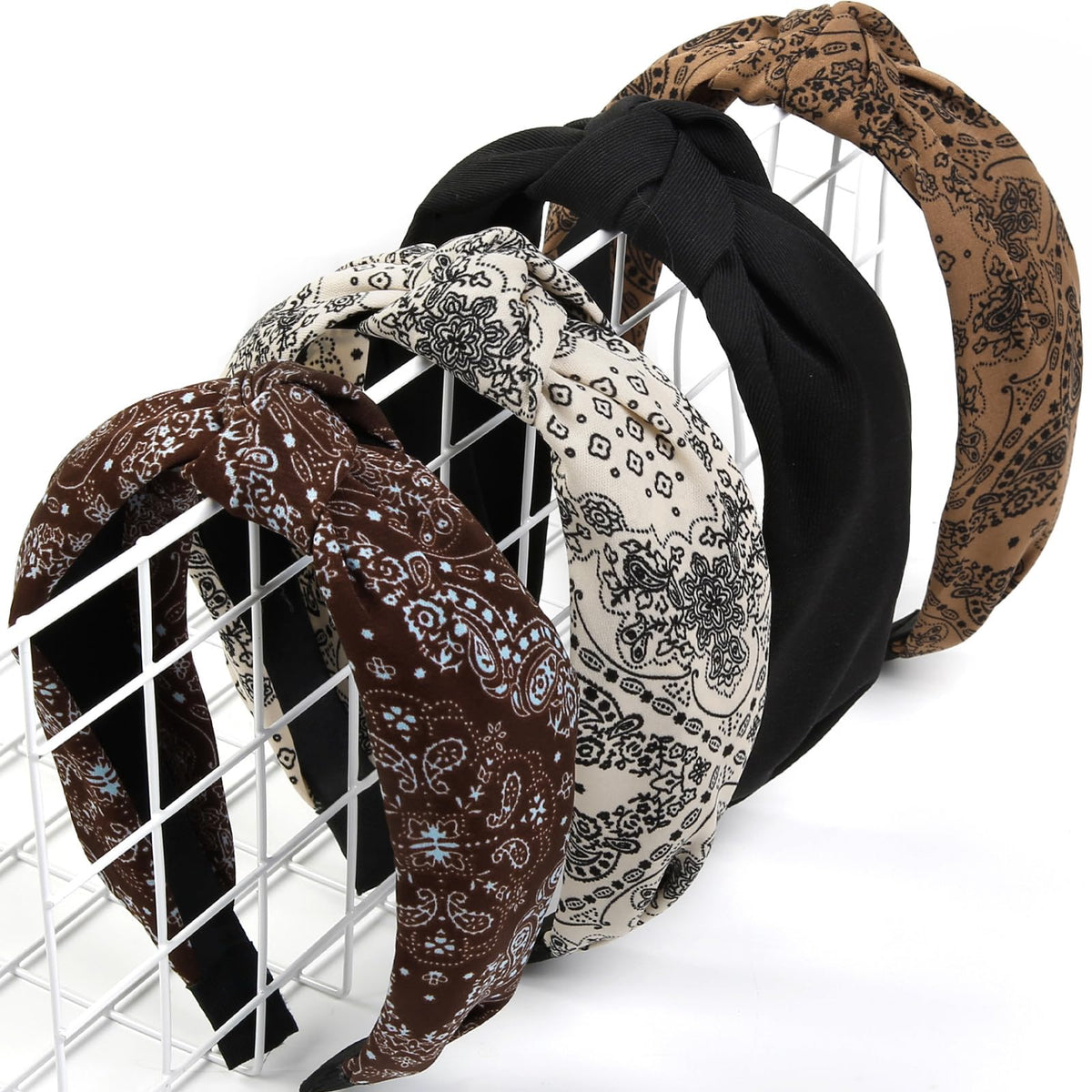 Huachi front view of four headbands showing knotted tops and prints, stylish utility