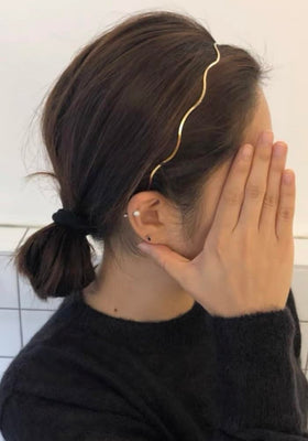 Huachi front packaging showing the gold and silver headbands and easy styling