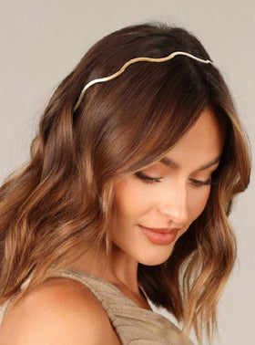 Huachi gold headband worn by model adding elegant shimmer and polish