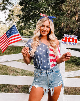 Huachi headband worn by model outdoors adding patriotic flair to celebration outfit