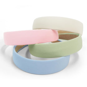 Huachi headband worn on model showing comfortable, headache-free hold