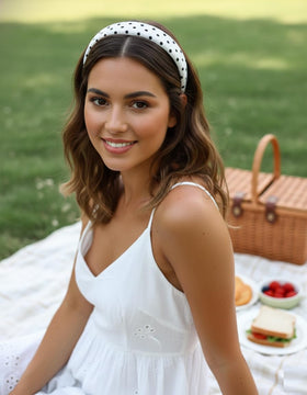 Huachi lifestyle shot of woman wearing headband outdoors adding retro charm and confidence