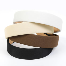 Huachi neutral color array flat lay showing versatile shades for outfit coordination