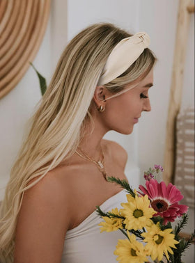 Huachi model wearing headband demonstrating comfortable fit and polished look