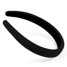 Huachi headband next to hand showing scale and comfortable size