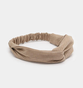 Huachi twist-knot close-up highlighting design and polished look