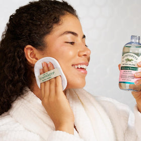 Humphreys applying toner with cotton pad for even application benefit
