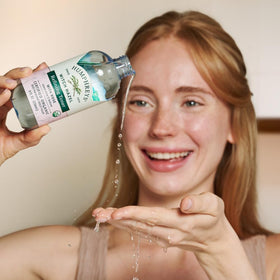 Humphreys 8 fl oz bottle beside everyday items showing true size