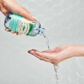 Humphreys bottle next to recycling symbol showing eco-friendly packaging benefit