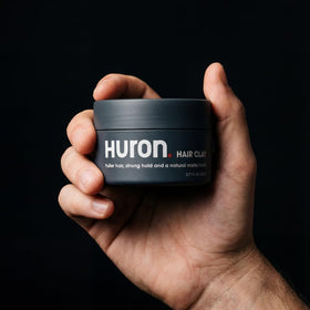 Huron ingredient label closeup highlighting non-toxic formula and scalp-safe benefit