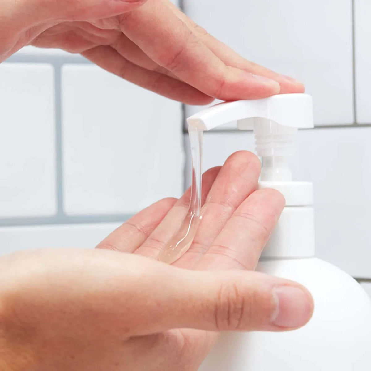 Huron in-shower use lifestyle photo showcasing refreshed, fragrant hair