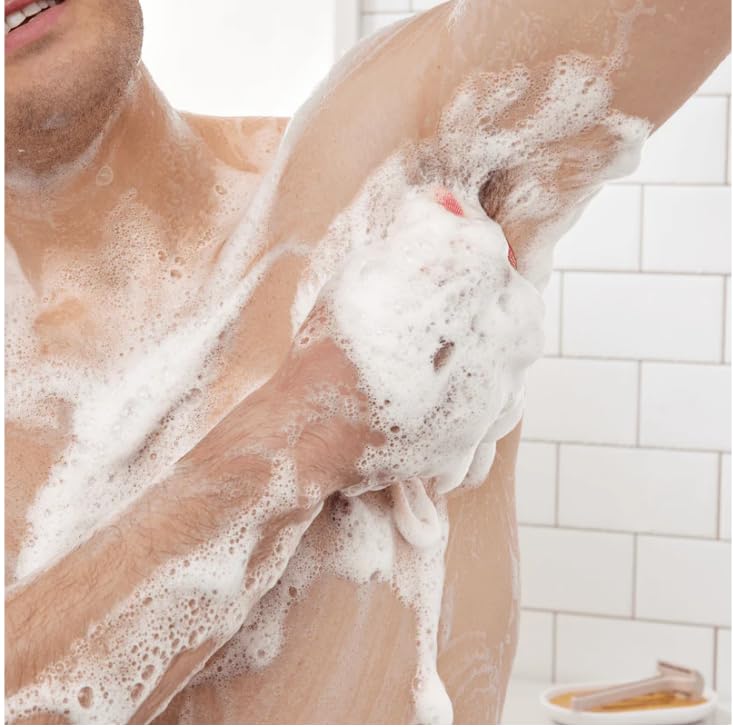 Huron in-shower use by man showing energizing wash and post-workout freshness benefit