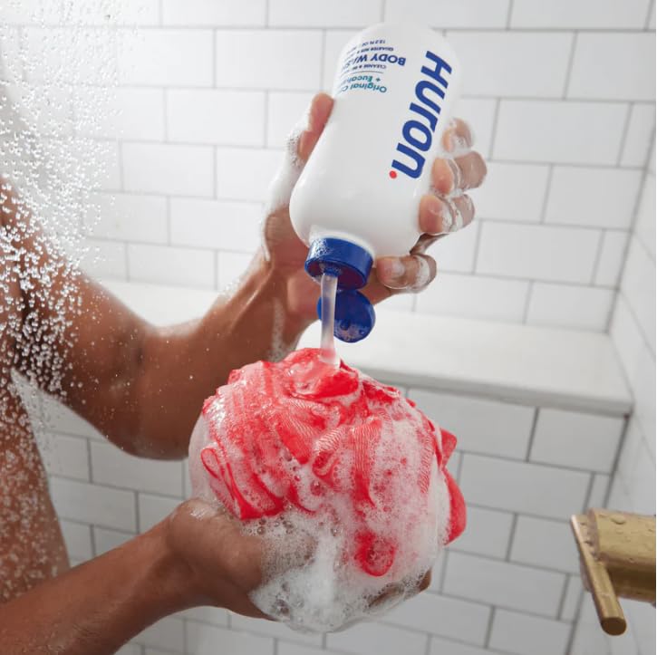 Huron body wash in use in shower showing fresh clean feeling for users