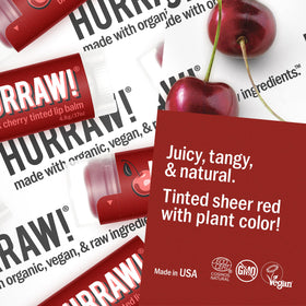 Texture swipe of black cherry balm on skin showcasing satin finish and natural pigment, subtle color