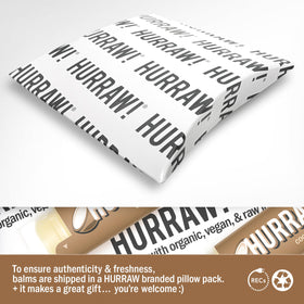 HURRAW! coconut balm texture swirl highlighting creamy, non-greasy moisturization