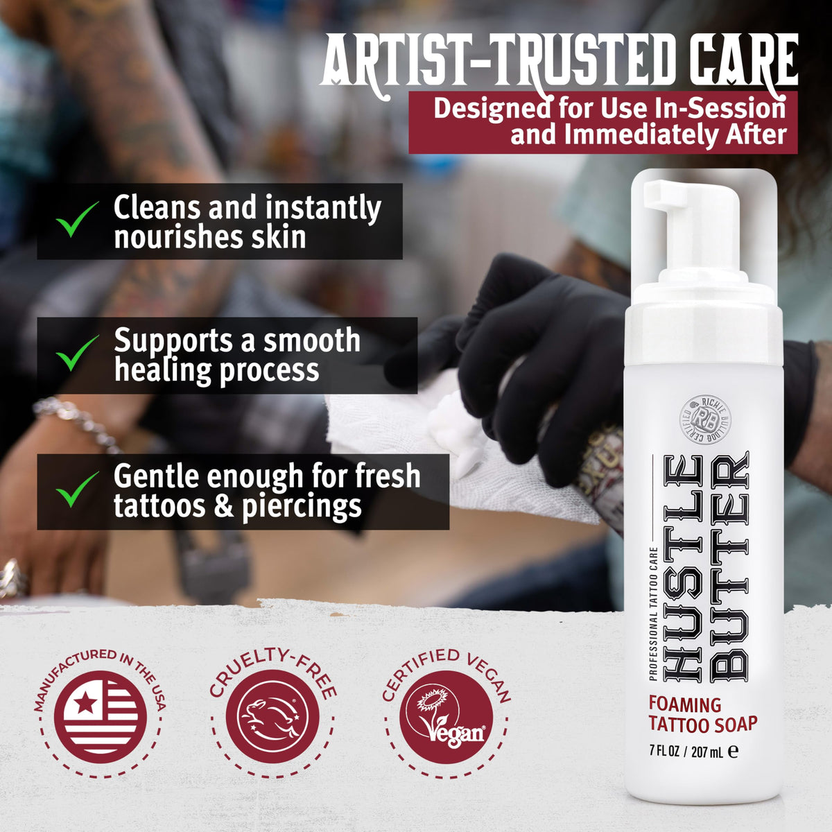 Tattoo artist applying Hustle Bubbles foam to a fresh tattoo, showing hygienic studio use