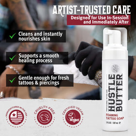 Tattoo artist applying Hustle Bubbles foam to a fresh tattoo, showing hygienic studio use