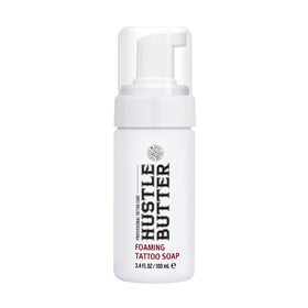 hustle butter deluxe front packaging showing bottle and cap, travel convenience