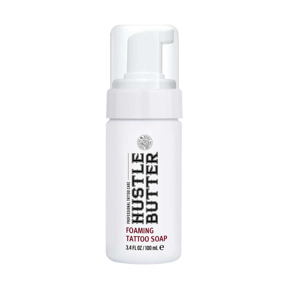 hustle butter deluxe front packaging showing bottle and cap, travel convenience