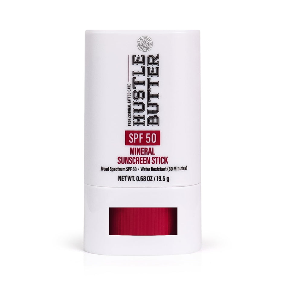 Hustle Butter front packaging showing compact sunscreen stick protecting tattoos