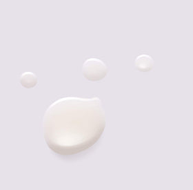 Close-up of prickly pear oil droplets on skin with Huxley branding, conveys nourishing glow