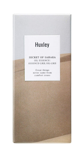 Huxley oil essence dropper dispensing clear texture, demonstrates quick absorption benefit