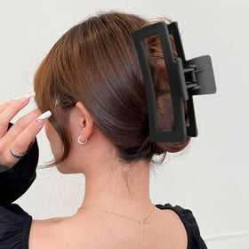 HXOGD model wearing clip in casual updo for easy everyday styling