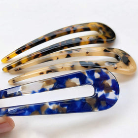 HYFEEL hair fork securing an updo side profile demonstrating secure, no-pull hold