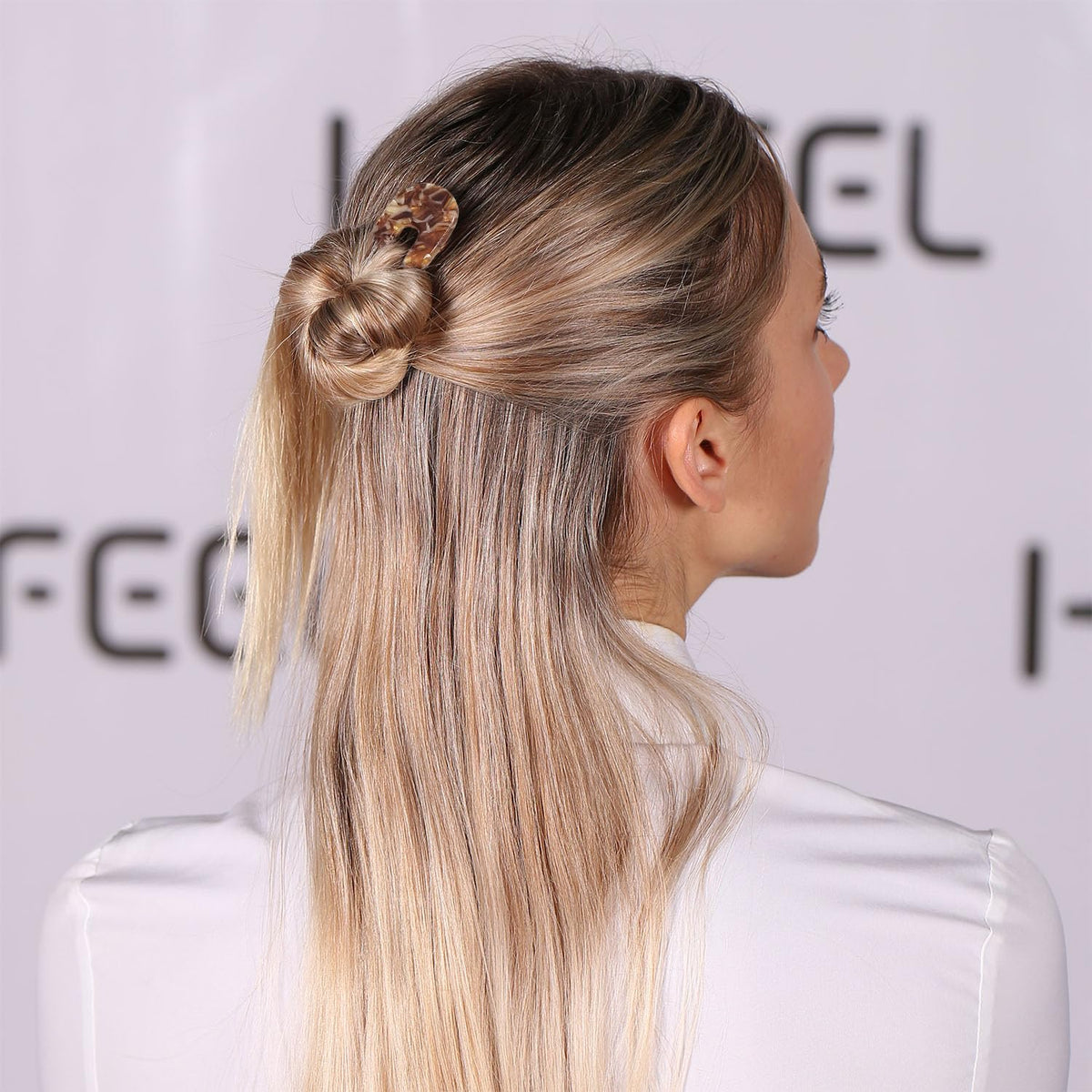 HYFEEL hair fork in use securing a chignon for long-lasting, comfortable updo support
