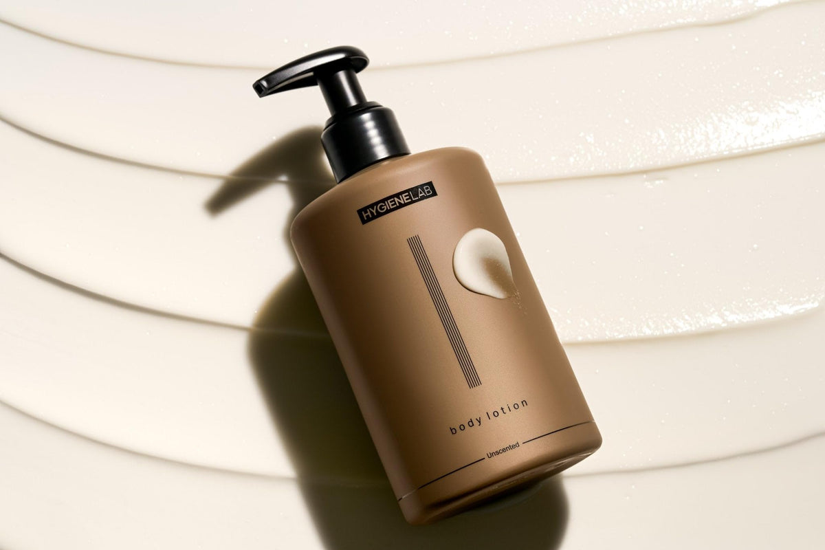 HygieneLab applying lotion to forearm demonstrating quick absorption and immediate softness