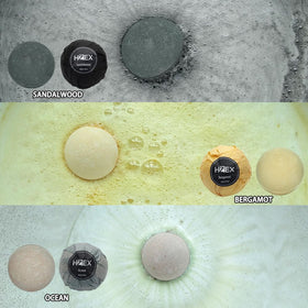 HZEX sandalwood bath bomb held in hand highlighting size and ease