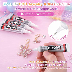 Ichiha tools and B7000 glue laid out for precise rhinestone application