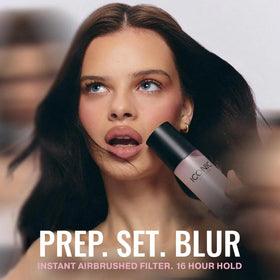 ICONIC LONDON model applying mist for refreshed, radiant complexion