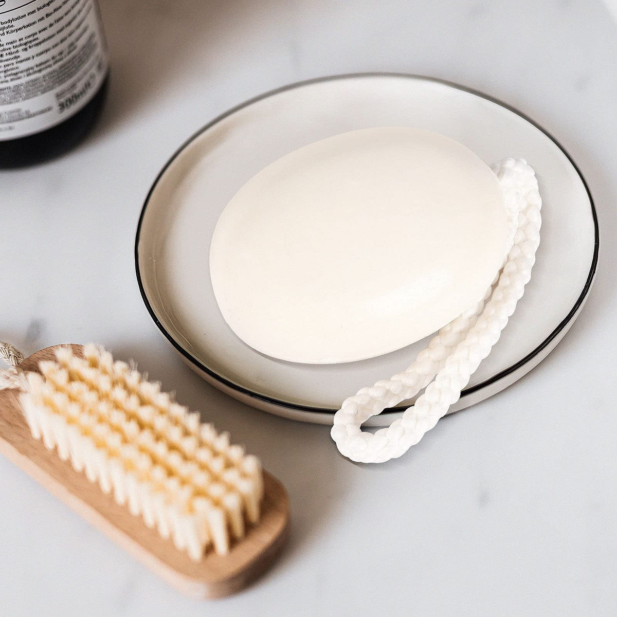 IeBilif bar in hand producing foam to show easy application benefit