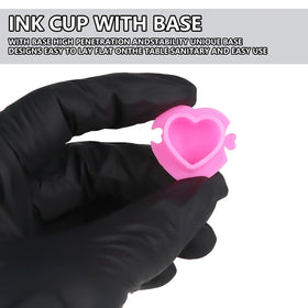 IFERO heart cup beside a coin to show size and practical pigment capacity