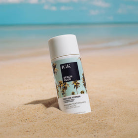 IGK Beach Club styled hair at beach setting conveying lived-in, textured volume