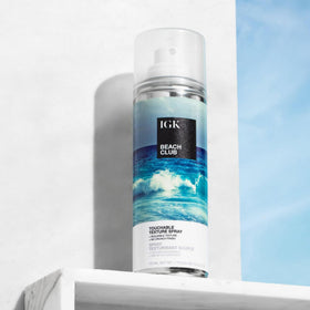 IGK misted on dry hair showing instant lift and refreshed texture