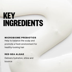 IGK shampoo and conditioner in use under shower for hydrated hair