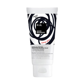 IGK Good Behavior travel packaging front view showing compact styling balm and portability