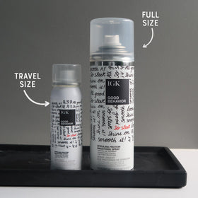 IGK travel size bottle for on-the-go frizz control and heat protection