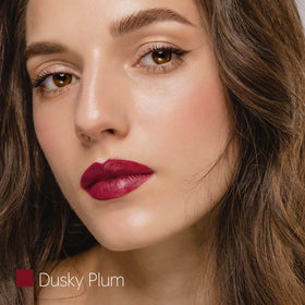 ilembane swatch on arm illustrating true dusky plum pigment and buildable color