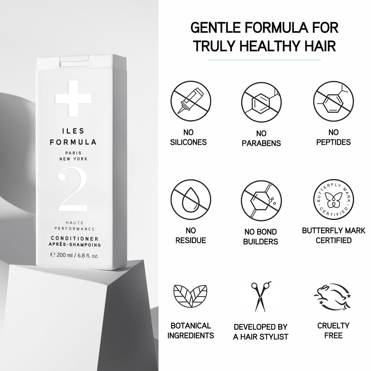 ILES FORMULA bottle staged in bathroom conveying everyday salon results